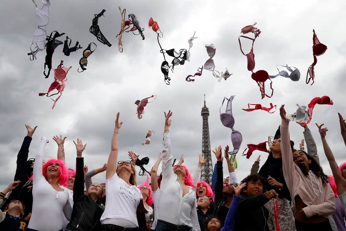 Paris: women throw their bras into the air as part of the annual Pink Bra Toss