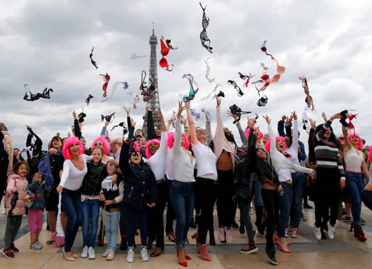 Paris: women throw their bras into the air as part of the annual Pink Bra Toss