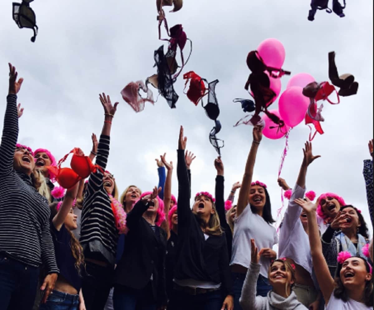 Paris: women throw their bras into the air as part of the annual Pink Bra Toss