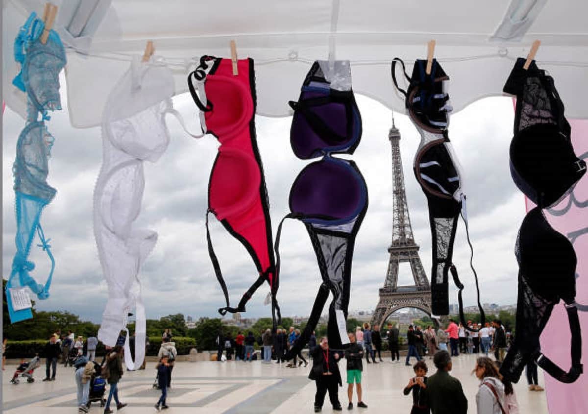 Paris: women throw their bras into the air as part of the annual Pink Bra Toss
