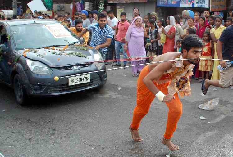 chandigarh, unwavering faith of people in religion, cheek piercing, superstition
