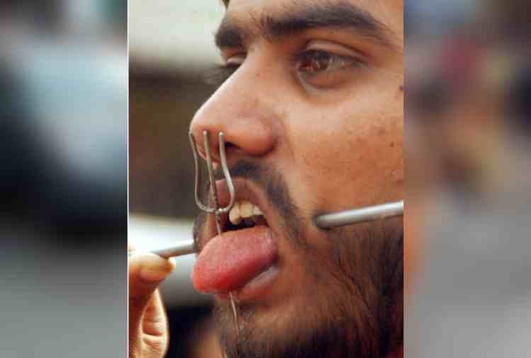 chandigarh, unwavering faith of people in religion, cheek piercing, superstition