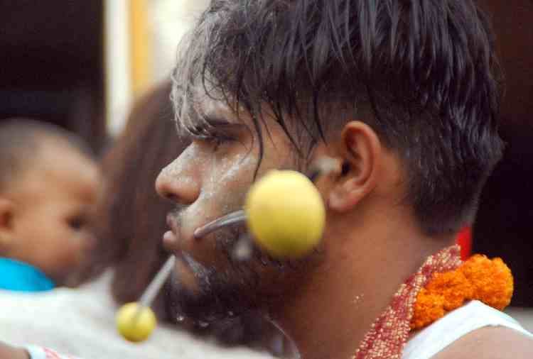 chandigarh, unwavering faith of people in religion, cheek piercing, superstition