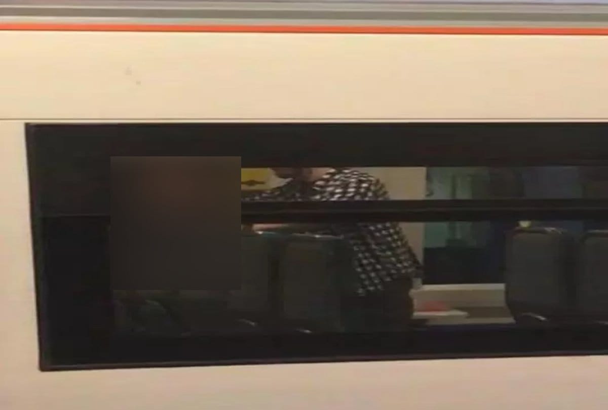 Couple intimate in a train at Britain 