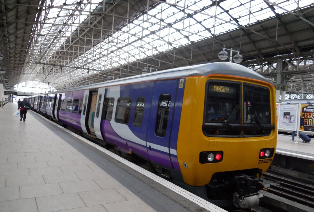 Couple intimate in a train at Britain 