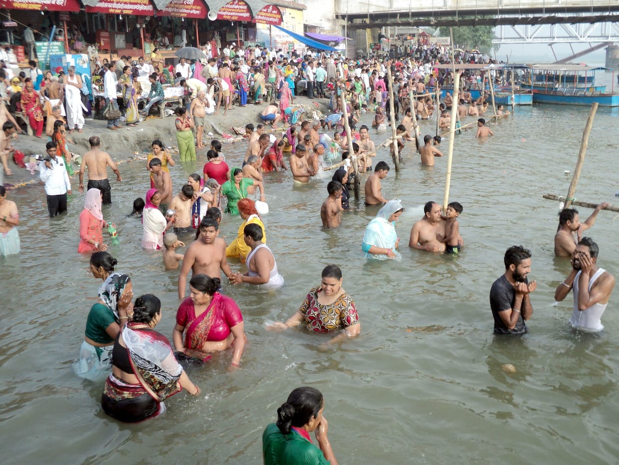 piligrims bath in ganga at brijghat