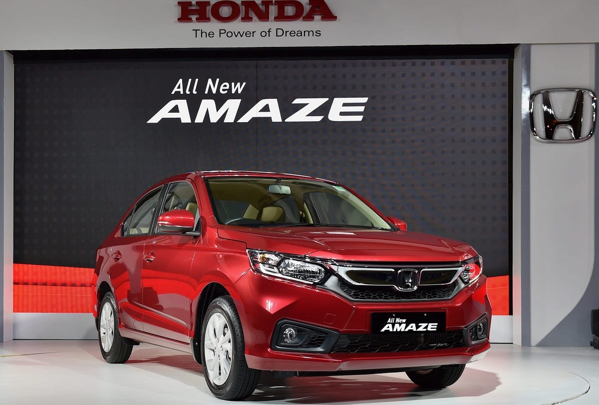 honda launches new amaze, will take on swift dzire