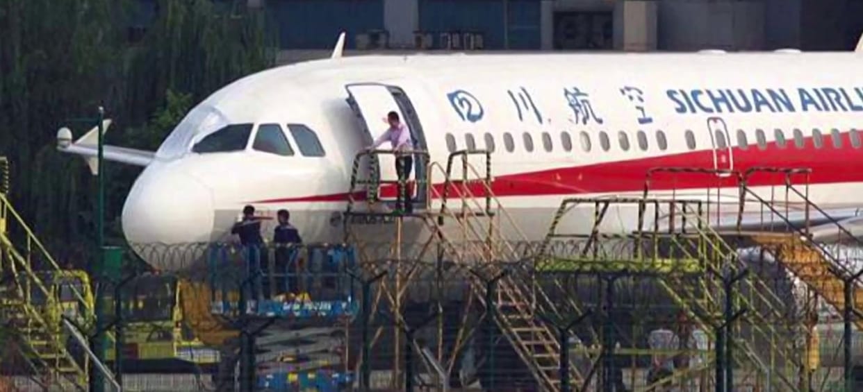 From southwestern China to Tibet Sichuan Airlines flight pilot sucked halfway out cockpit window