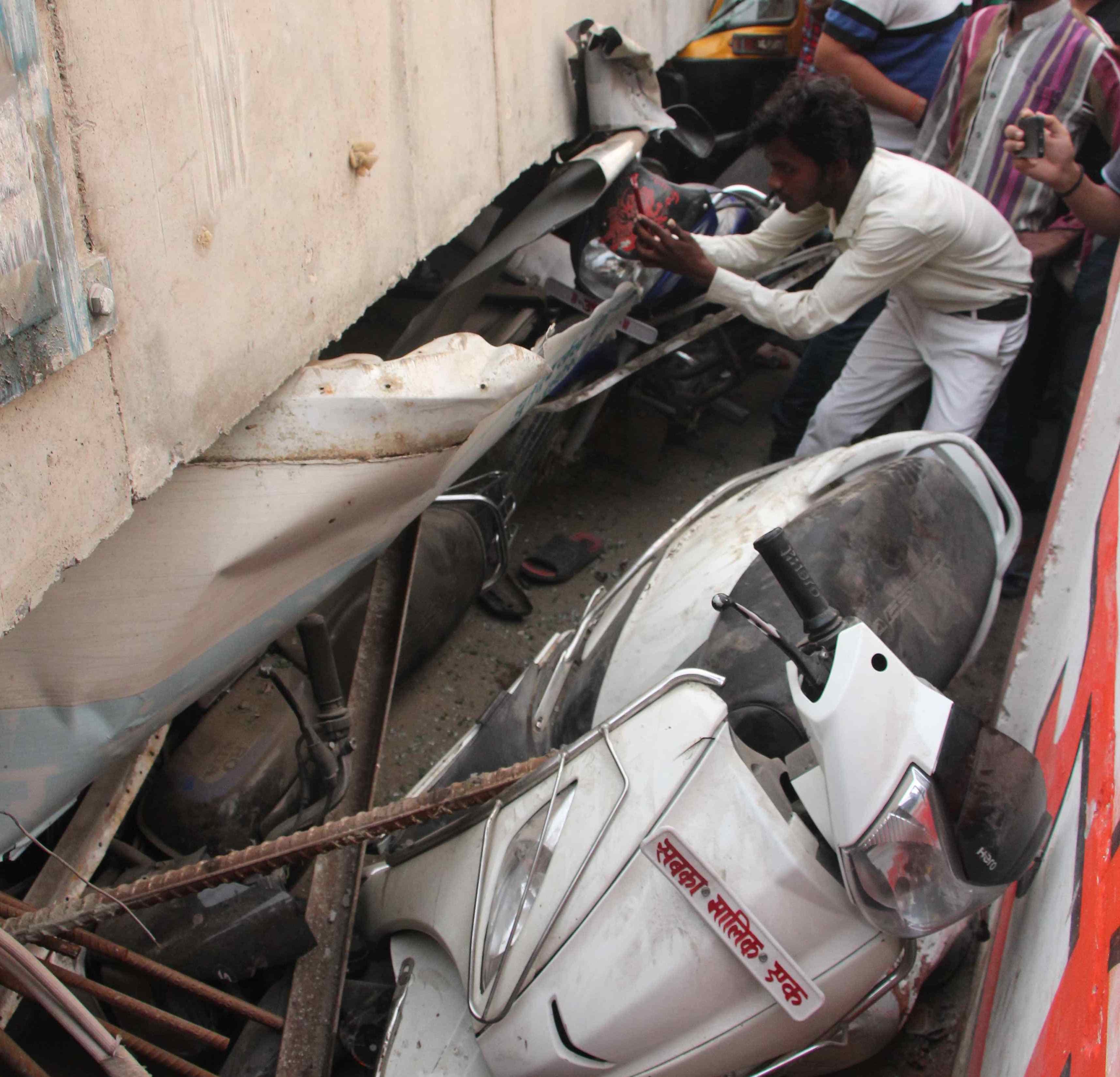Father and son killed in flyover collapse at varanasi