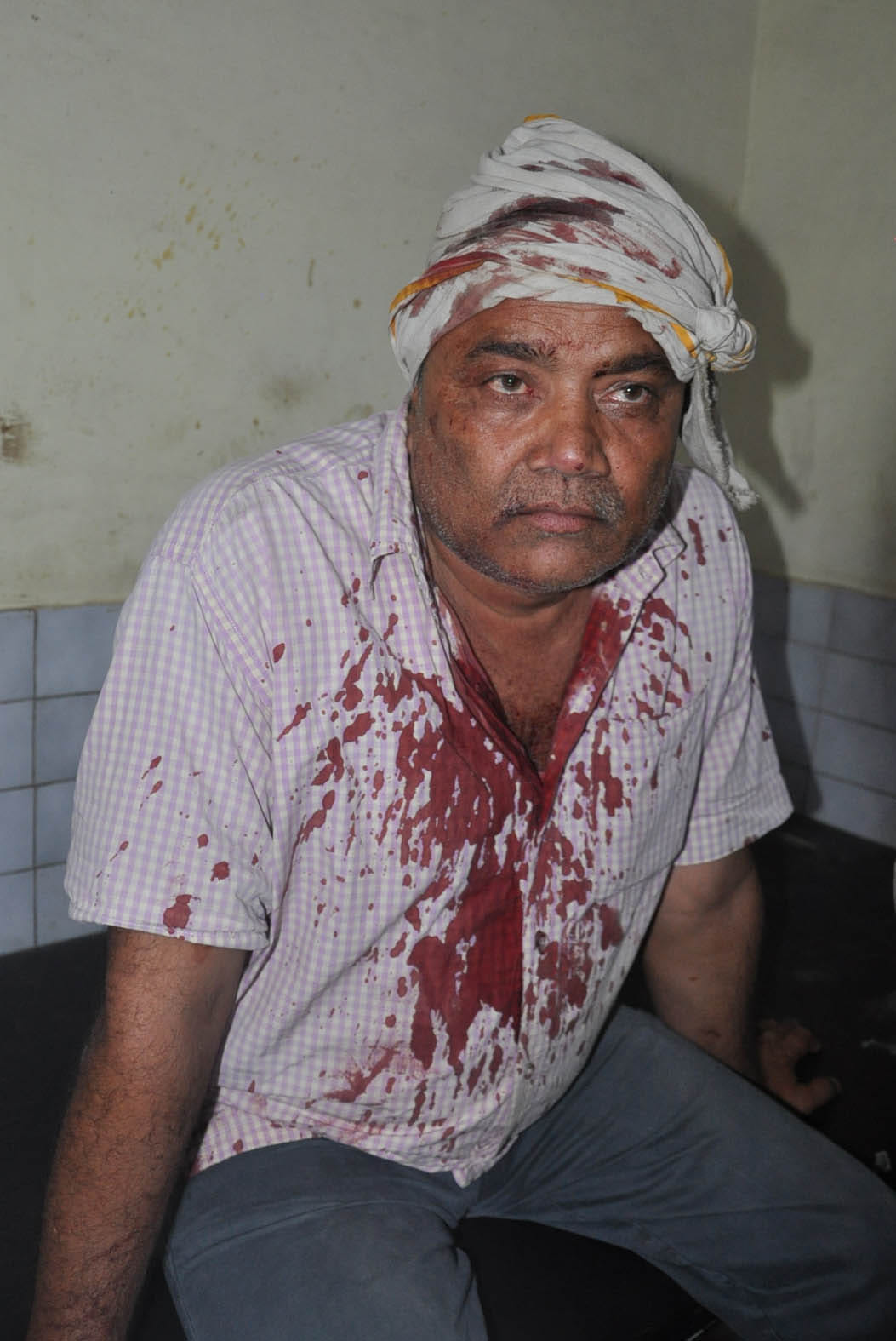 Midwife beaten, wounded