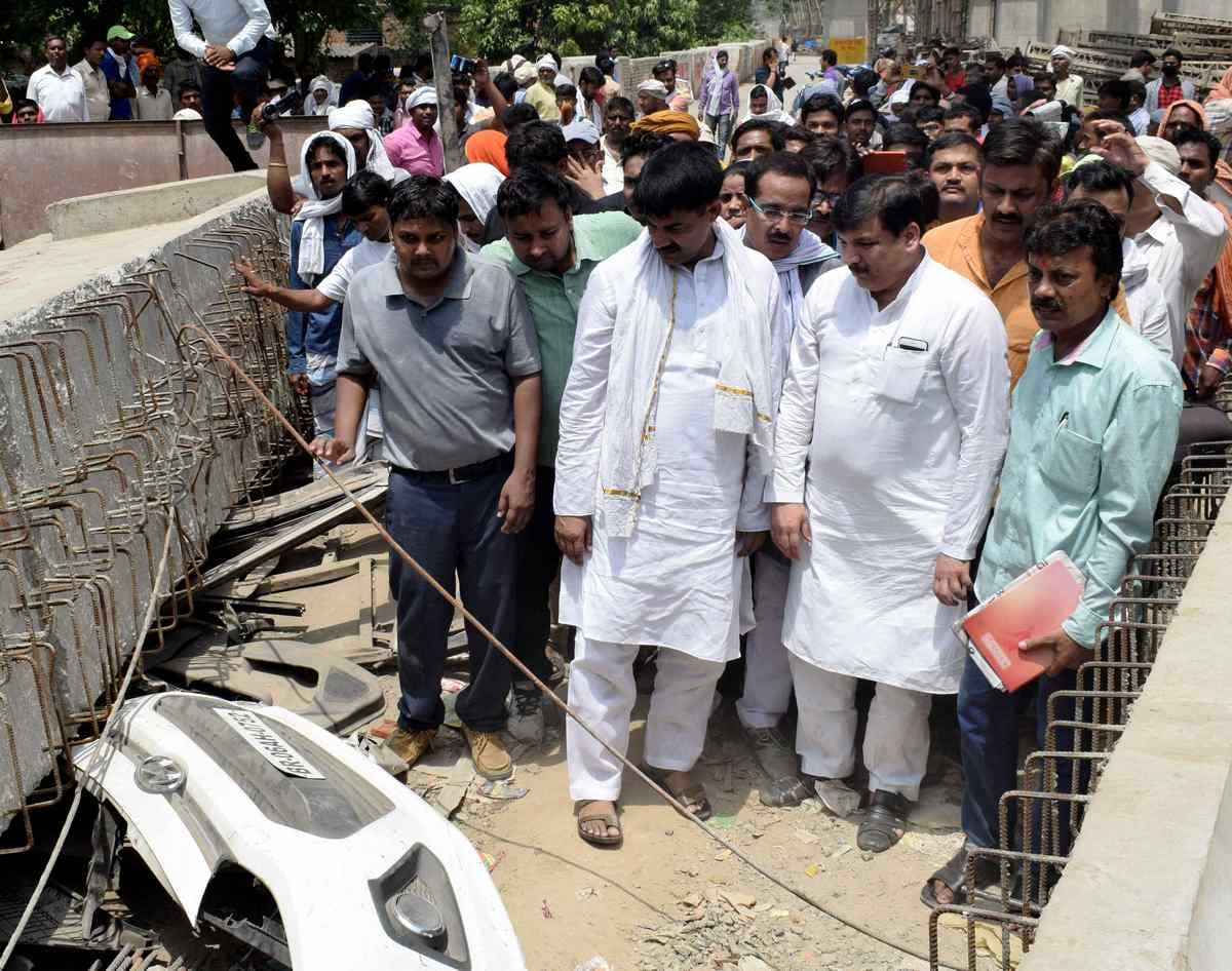 varanasi flyover collapse politics going fast congress protest for case 
