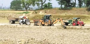 Illegal mining from JCB in ponds