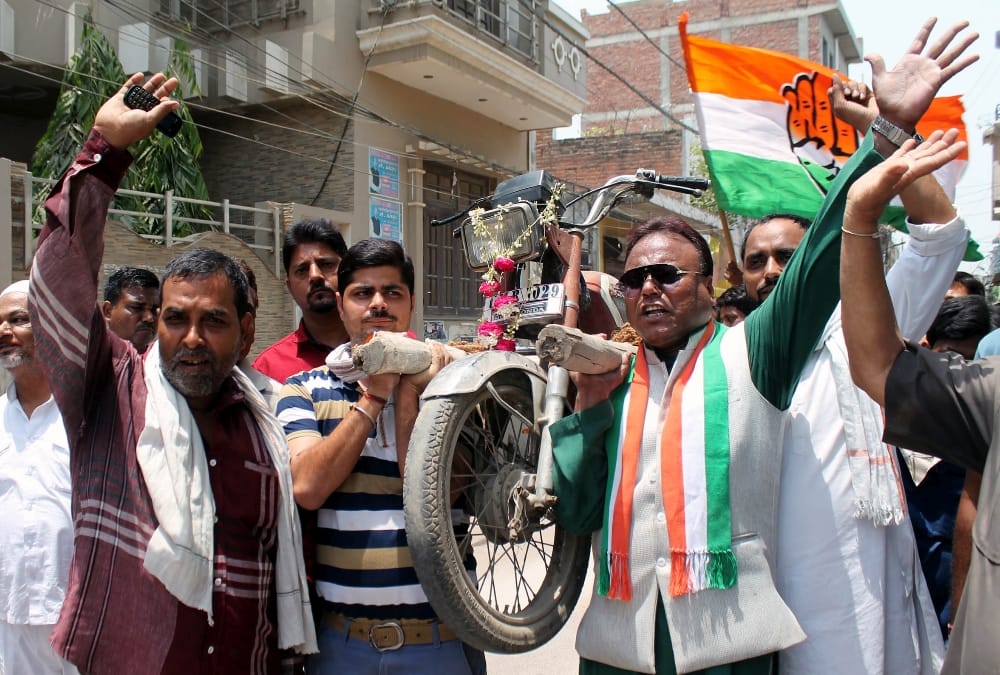 congress activists protest against fuel price hike.