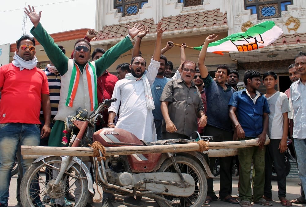 congress activists protest against fuel price hike.