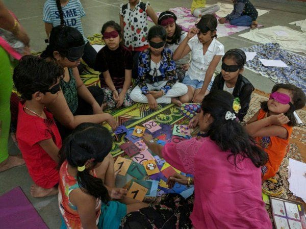 Children reading books to close eyes