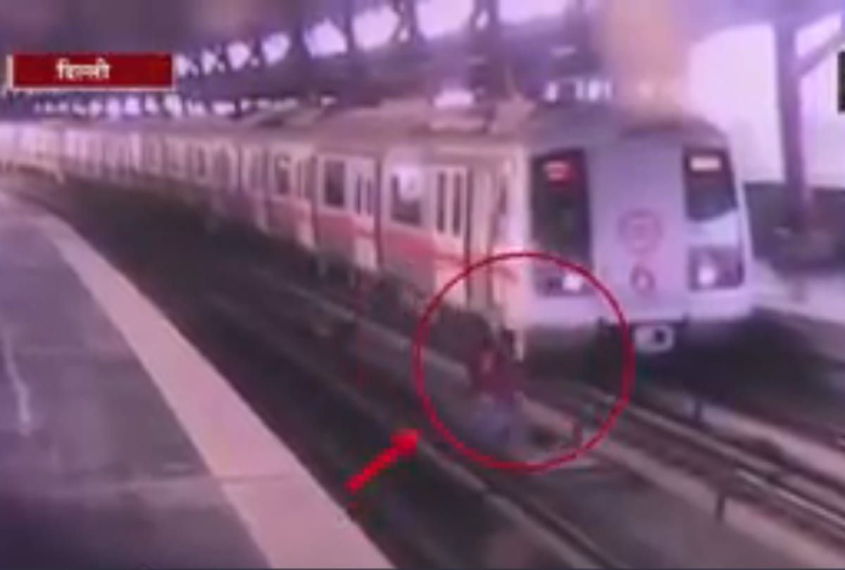 a man narrow escape when delhi metro driver stops metro while he was crossing flatform via track