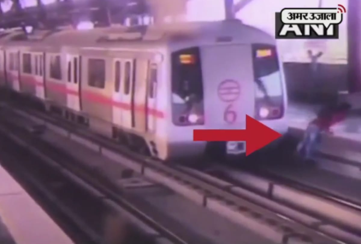 a man narrow escape when delhi metro driver stops metro while he was crossing flatform via track