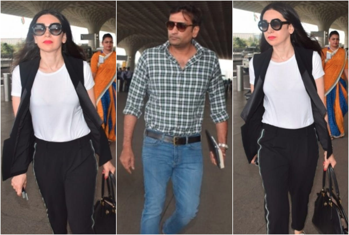 Karisma Kapoor and Sandeep Toshniwal spotted airport off for a vacation 