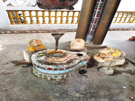 People shouting at Shivling from temple