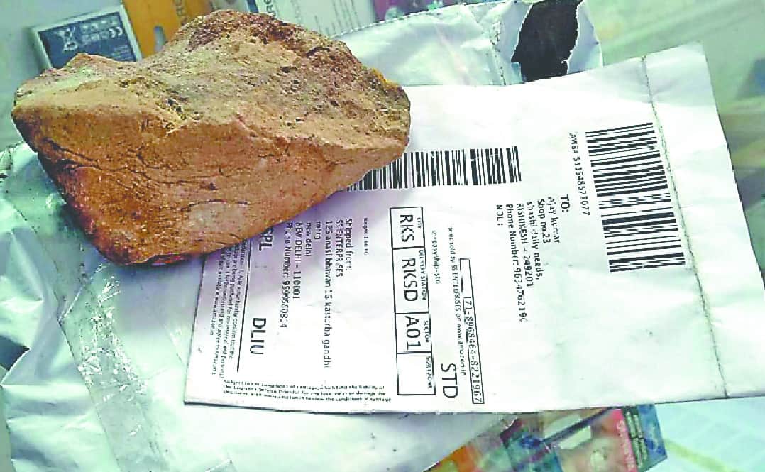 Stone found instead camera online shopping parcel