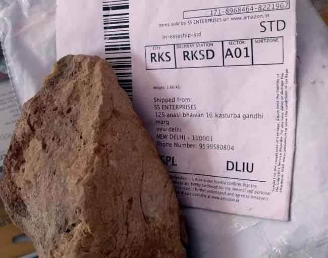 Stone found instead camera online shopping parcel