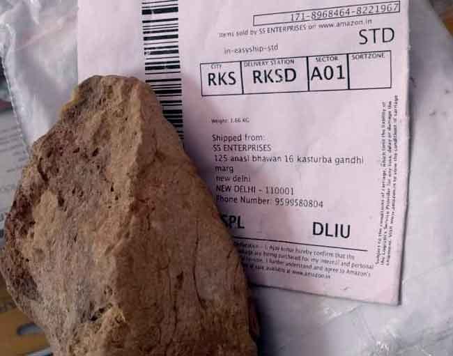 Stone found instead camera online shopping parcel