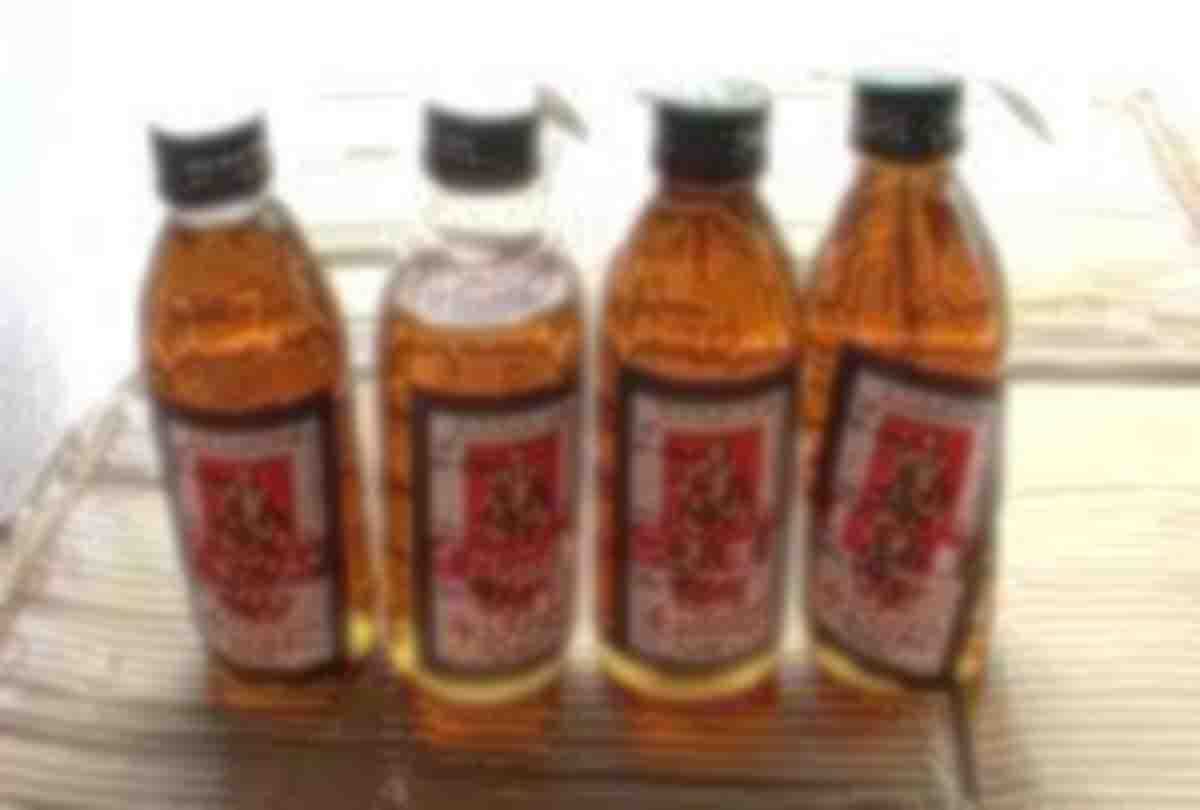 Two women arrested with 74 quarters of liquor