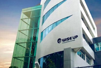 story of Billionaire who started business with public telephones