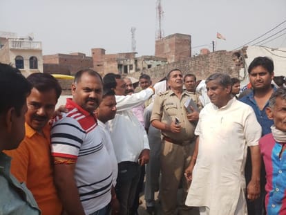 bjp and sp workers planted party flag at government office