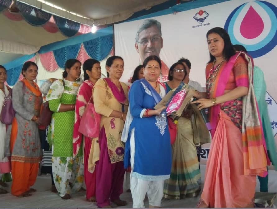 women shouting during Sanitary napkin distribution on World Menstrual Hygiene Day 2018