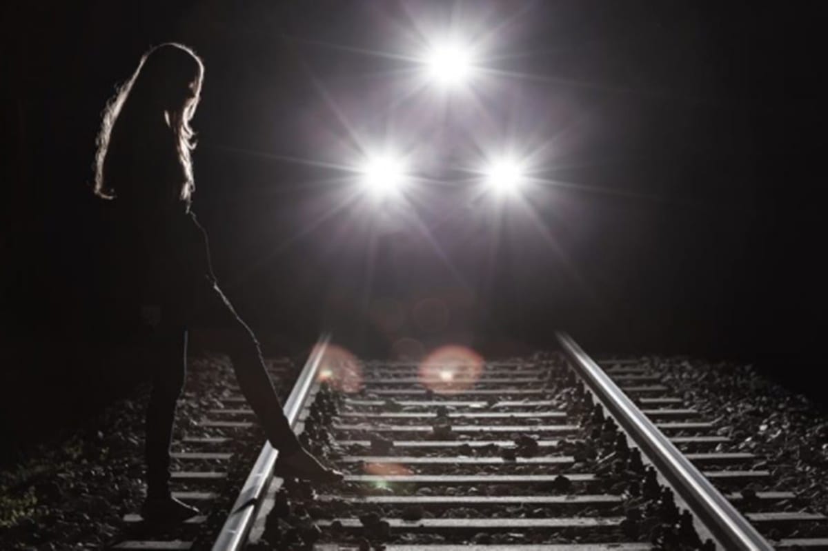 cousins allegedly committed suicide by jumping in front of train near Tughlakabad railway station