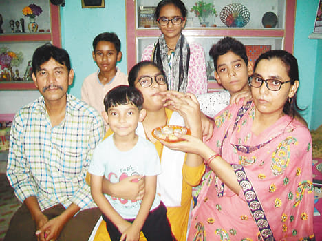 Zaoba Parveen Bani District Topper after getting 98.8% marks
