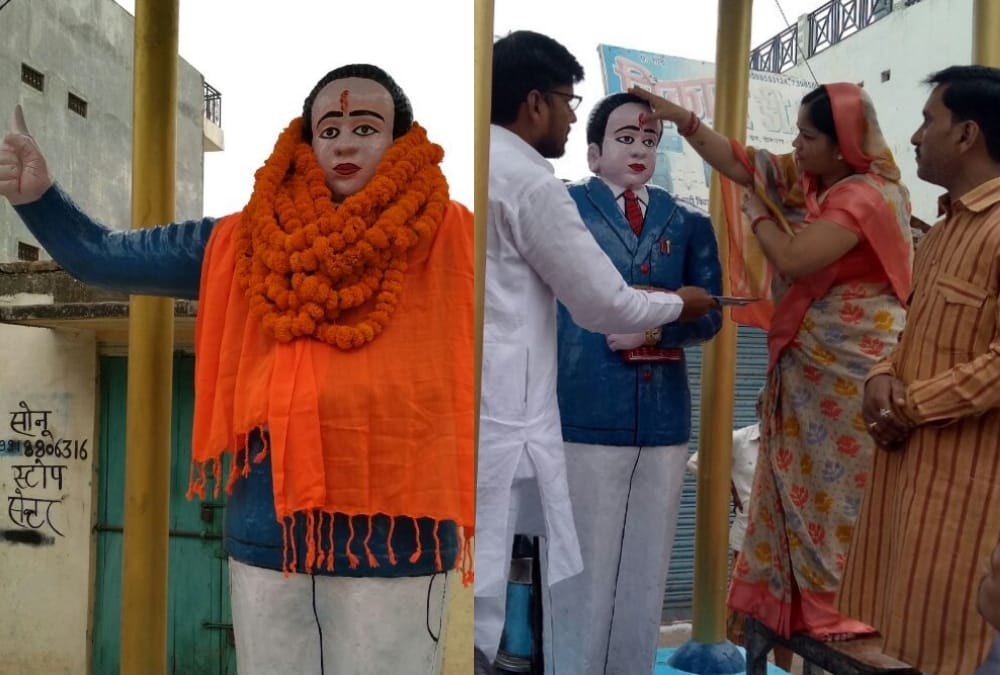 BJP MLA put on saffron clothes on ambedkar statue.