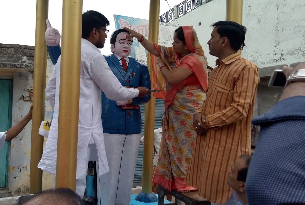BJP MLA put on saffron clothes on ambedkar statue.