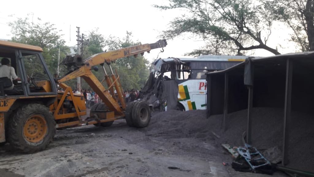 man dies in truck collides with tourist bus