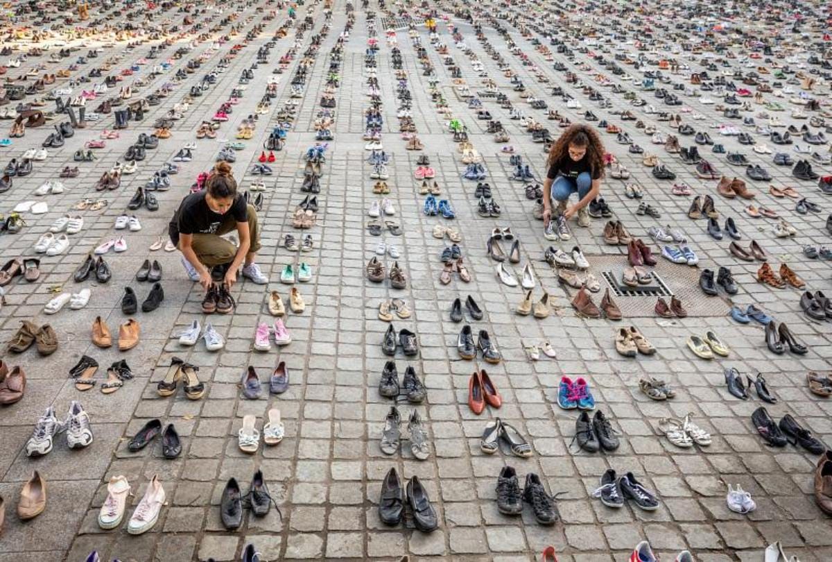 Across four thousand pairs of shoes displayed near EU building over Palestinian deaths