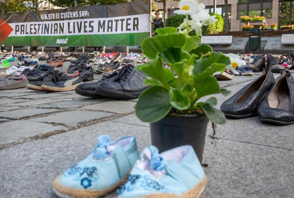 Across four thousand pairs of shoes displayed near EU building over Palestinian deaths