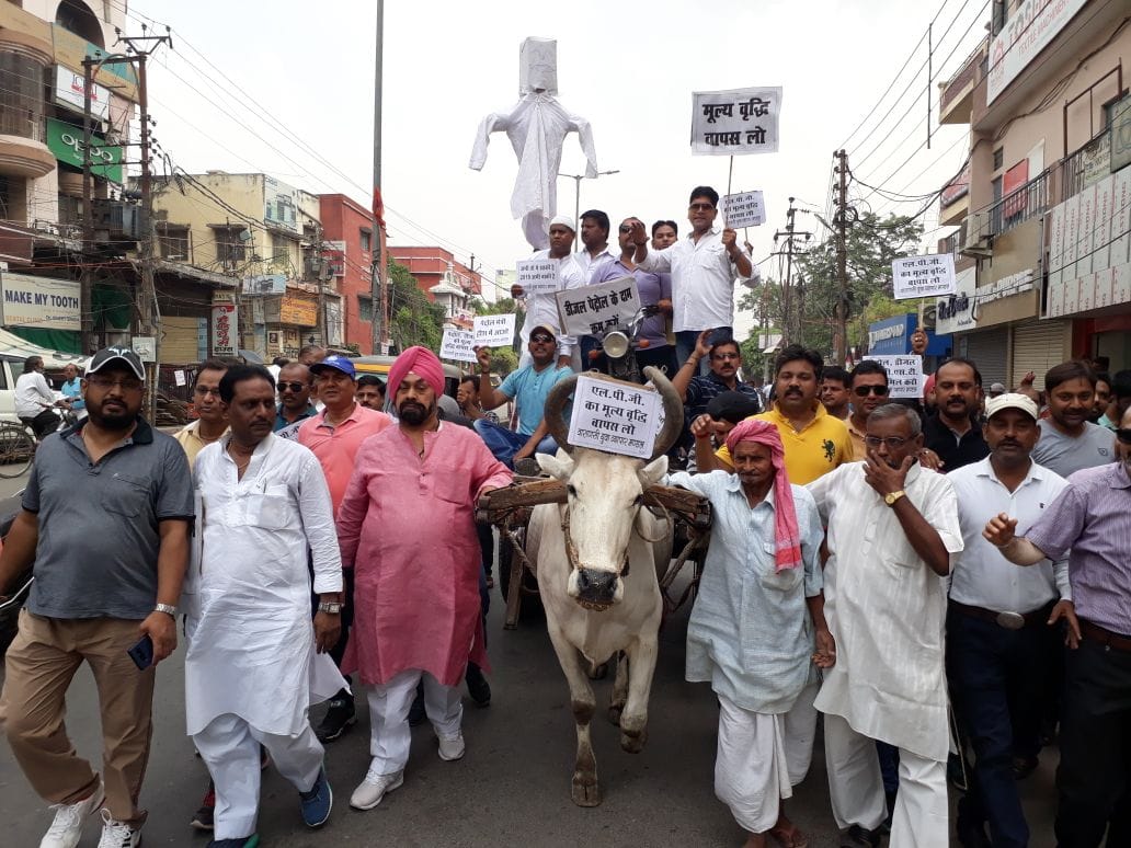 Varanasi traders protest with bullock cart against inflation