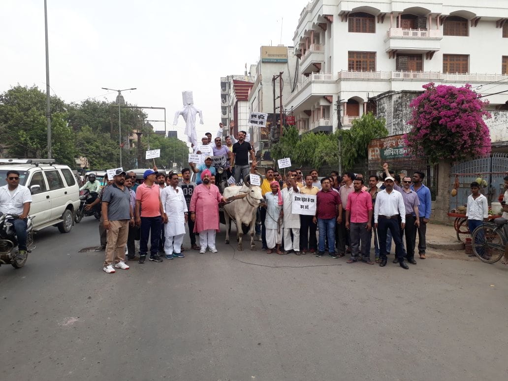 Varanasi traders protest with bullock cart against inflation