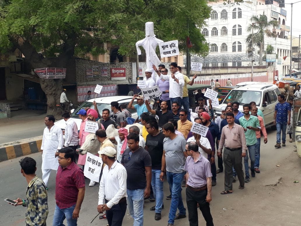 Varanasi traders protest with bullock cart against inflation