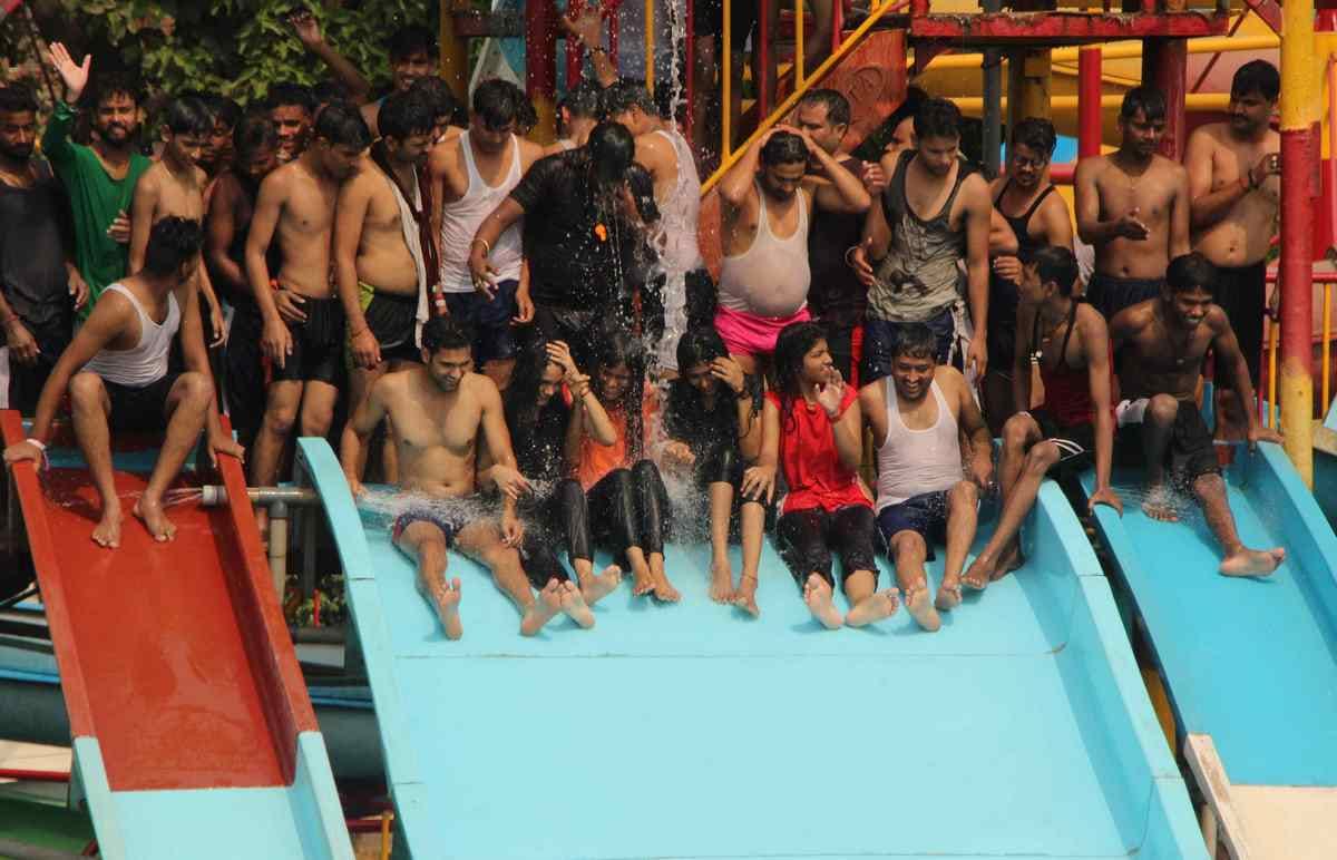 Varanasi people have fun in the water park with games