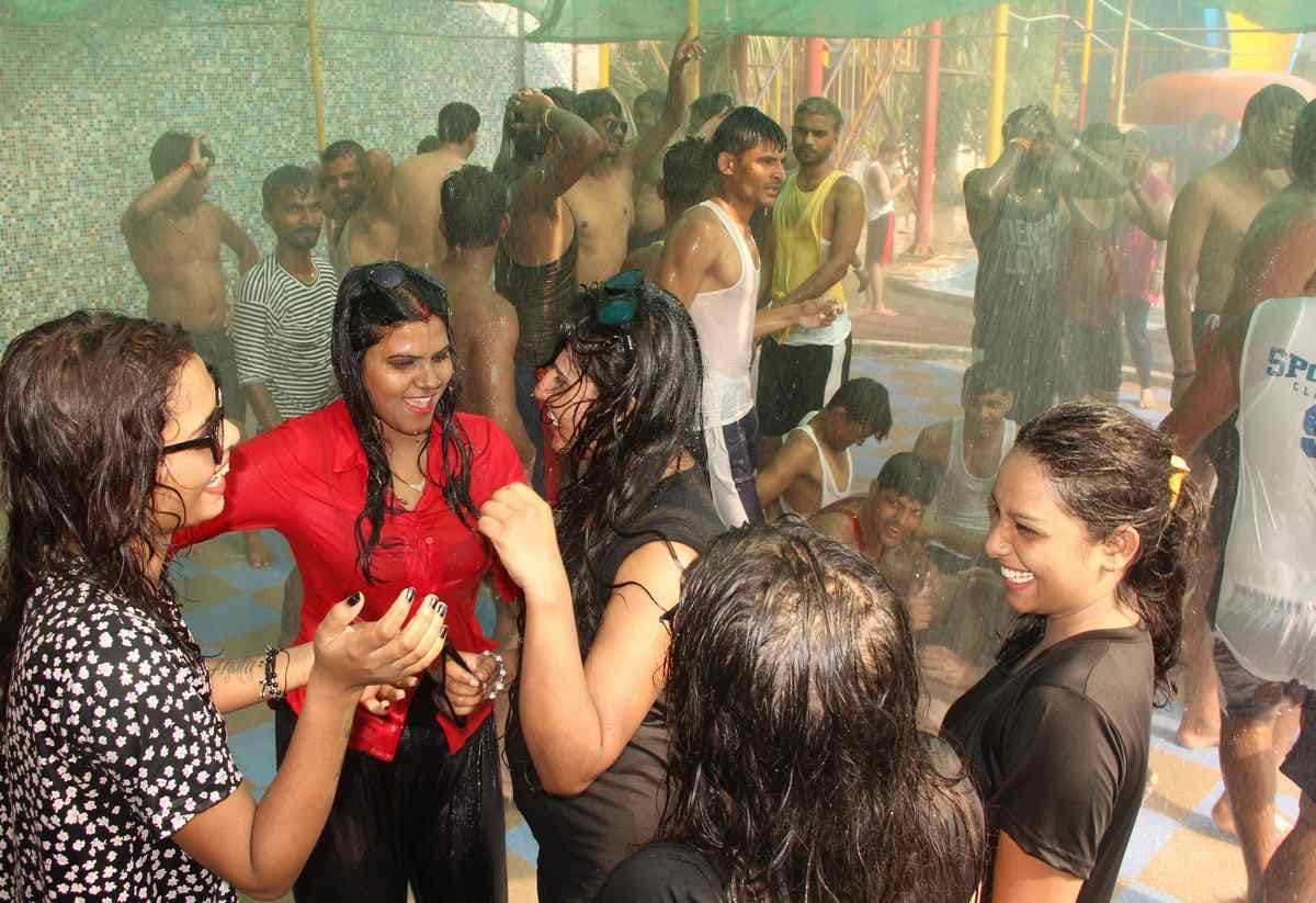 Varanasi people have fun in the water park with games