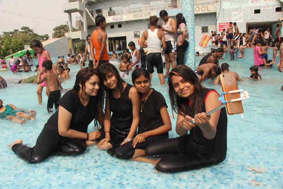 Varanasi people have fun in the water park with games