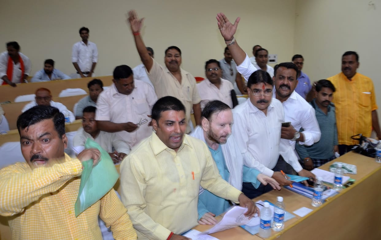 Municipal Corporation: Break the Mike at the Board Meeting, throw away copies of the budget