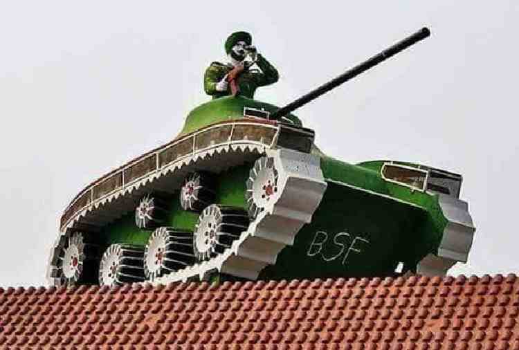 unique village, indian army tankers on roofs of village people houses