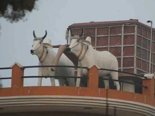 unique village, indian army tankers on roofs of village people houses