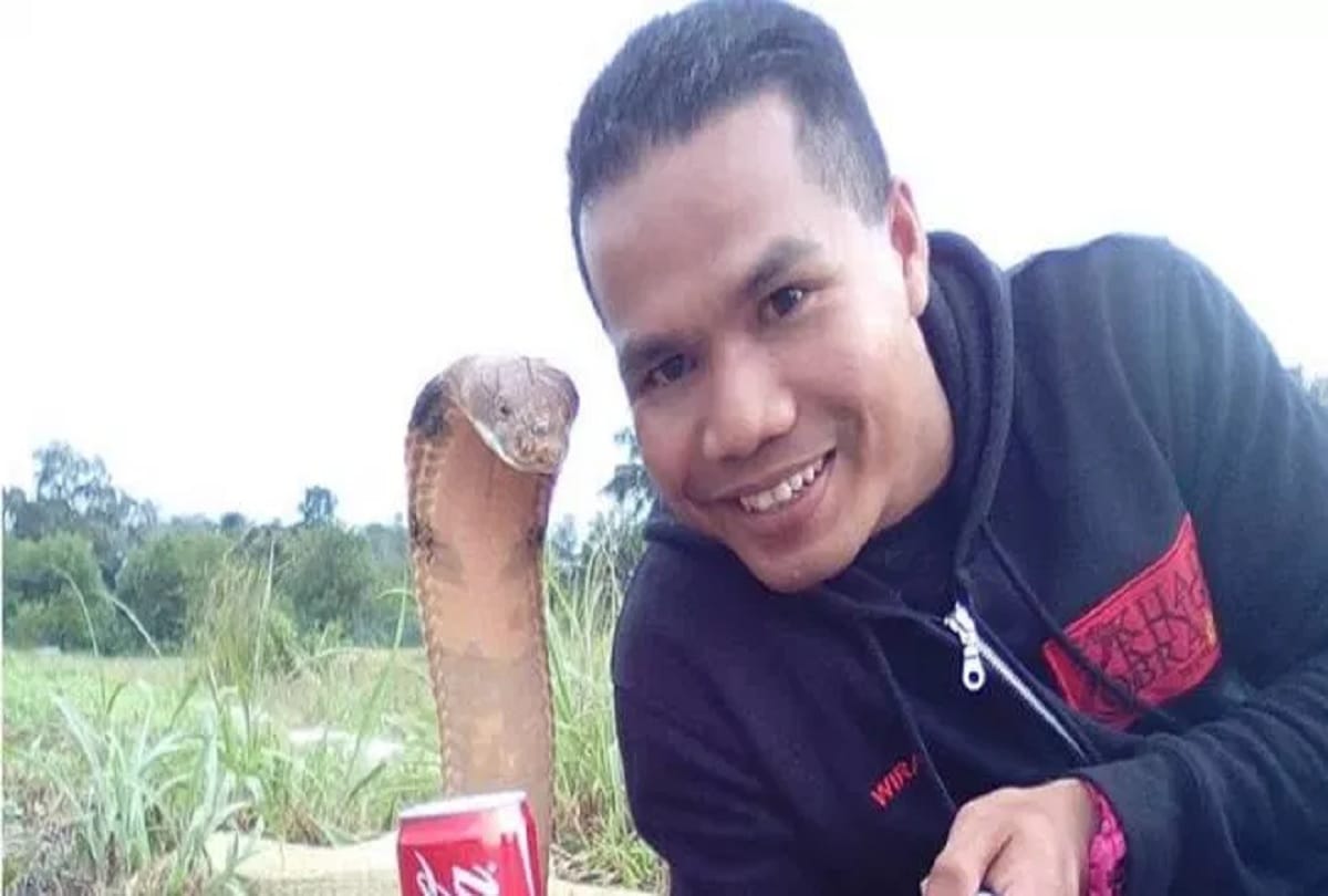 A man marries 10ft COBRA he believes is his dead girlfriend reincarnated