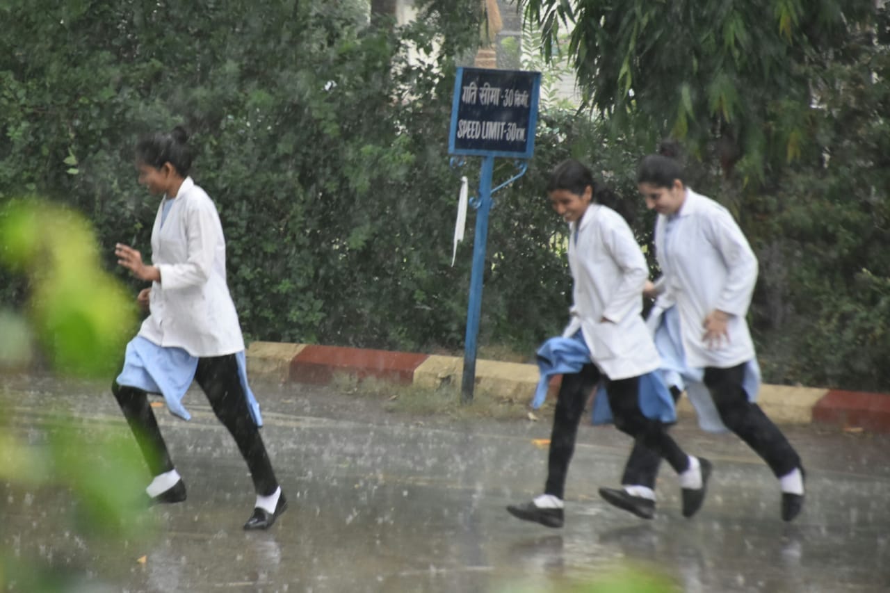 varanasi weather change people enjoy storm and rain