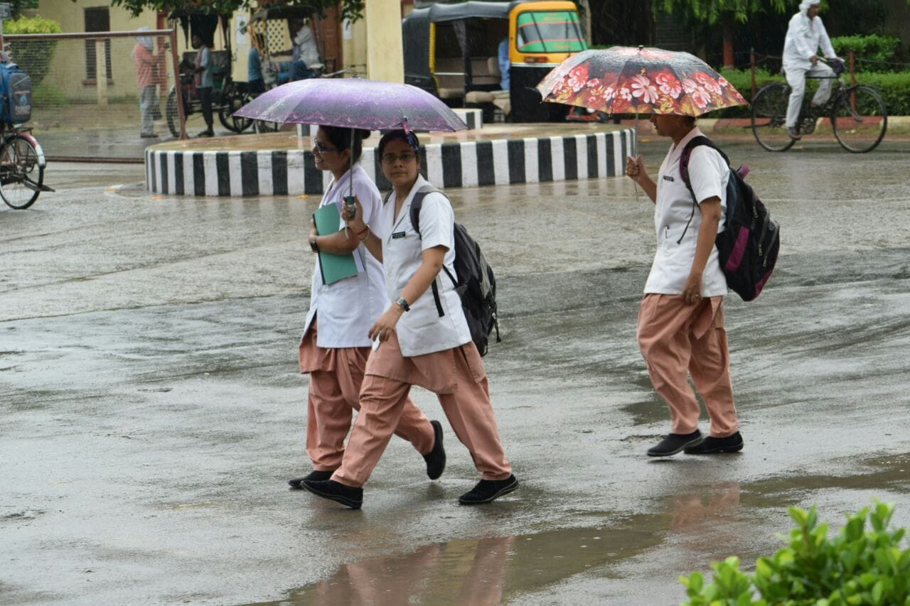 varanasi weather change people enjoy storm and rain