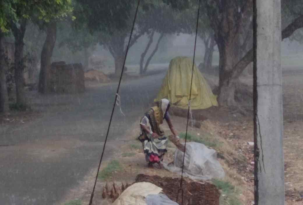 varanasi weather change people enjoy storm and rain